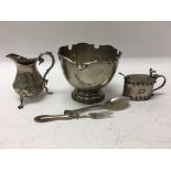 A collection of silver including a bowl, milk jug