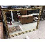 A gilt framed rectangular wall mirror, approx 120c