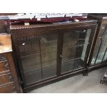 A mahogany two door glazed display cabinet, approx