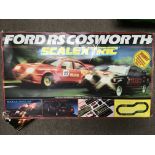 A boxed Scalextric RS Cosworth set (missing cars)