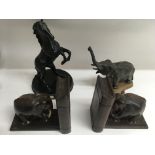 A Marley horse, spelter model elephant and pair of carved wood bookends