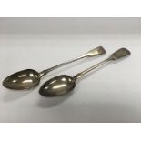 A large Georgian silver spoon plus a Victorian exa