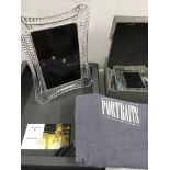 Five boxed Waterford crystal photo frames.