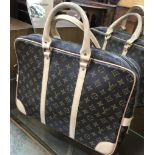 A Louis Vuitton designer laptop or 'grab' bag.Approx 34x44cm