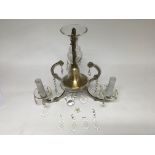 A three branch cut glass chandelier manufactured in Czechoslovakia with bohemian crystal.