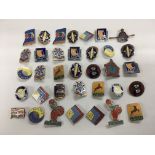 A collection of vintage enamel Butlin's badges.