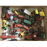 A box of unboxed tractors, steam rollers, dumper t