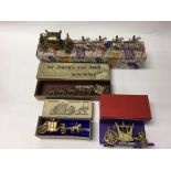 A collection of 2 boxed Britain’s 1953 Coronation coaches and 2 boxed Crescent Toys Coronation