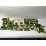 A large collection of boxed and carded ERTL model tractors including John Deere (please note most