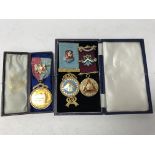 Three boxed Masonic medals.