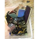 A box of WW2 military items including a gas mask a