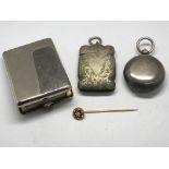 A 15ct gold stick pin, silver vesta, sovereign cas