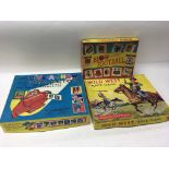 3 boxed games including Wild West Race Game, Blow Football and Chad Valley Give-a-Show projector.