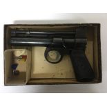 A boxed Webley air pistol junior model