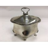 A silver tea caddy with parcel gilt interior and r