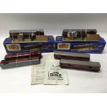 2 boxed Hornby OO gauge TPO Mail Van Sets, 2 unboxed sets and 4 Royal Mail cars.