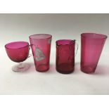 A collection of cranberry glass including Victorian Mary Gregory.