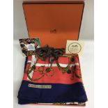 A boxed Hermes designer silk scarf