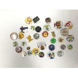 A bag containing a collection of various children’s badges