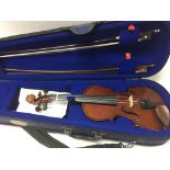 Two Stentor violins a half and a quarter size .