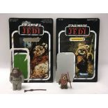 A collection of 4 vintage Star Wars: Return of The Jedi Ewok figures with original card backs,