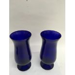 A pair of Bristol blue glass footed vases