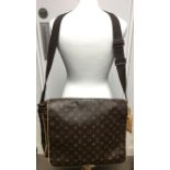 A Louis Vuitton satchel bag with interior and exterior slip and zip pockets, adjustable embossed