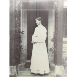 A Edwardian Governess Uniform comprising of a long grey skirt, matching blouse with stand up collar,