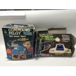 A boxed Videomaster Colourscore Home TV game, a boxed Space Laser Fight, Command Pilot and a