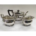 A three piece silver tea service, Birmingham hallmarks, approx 754g.