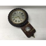 A large mahogany cased wall clock