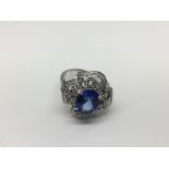 A 14ct white gold tanzanite and diamond ring in th