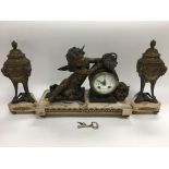 An 8 day marble and spelter figural clock and garnitures, the clock depicting a seated cherub with