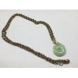 A jade pendant on 9ct gold chain