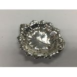 A silver leaf shaped dish, approx 9cm length x 8cm length. Birmingham hallmarks.