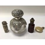 A collection of vintage perfume bottles including