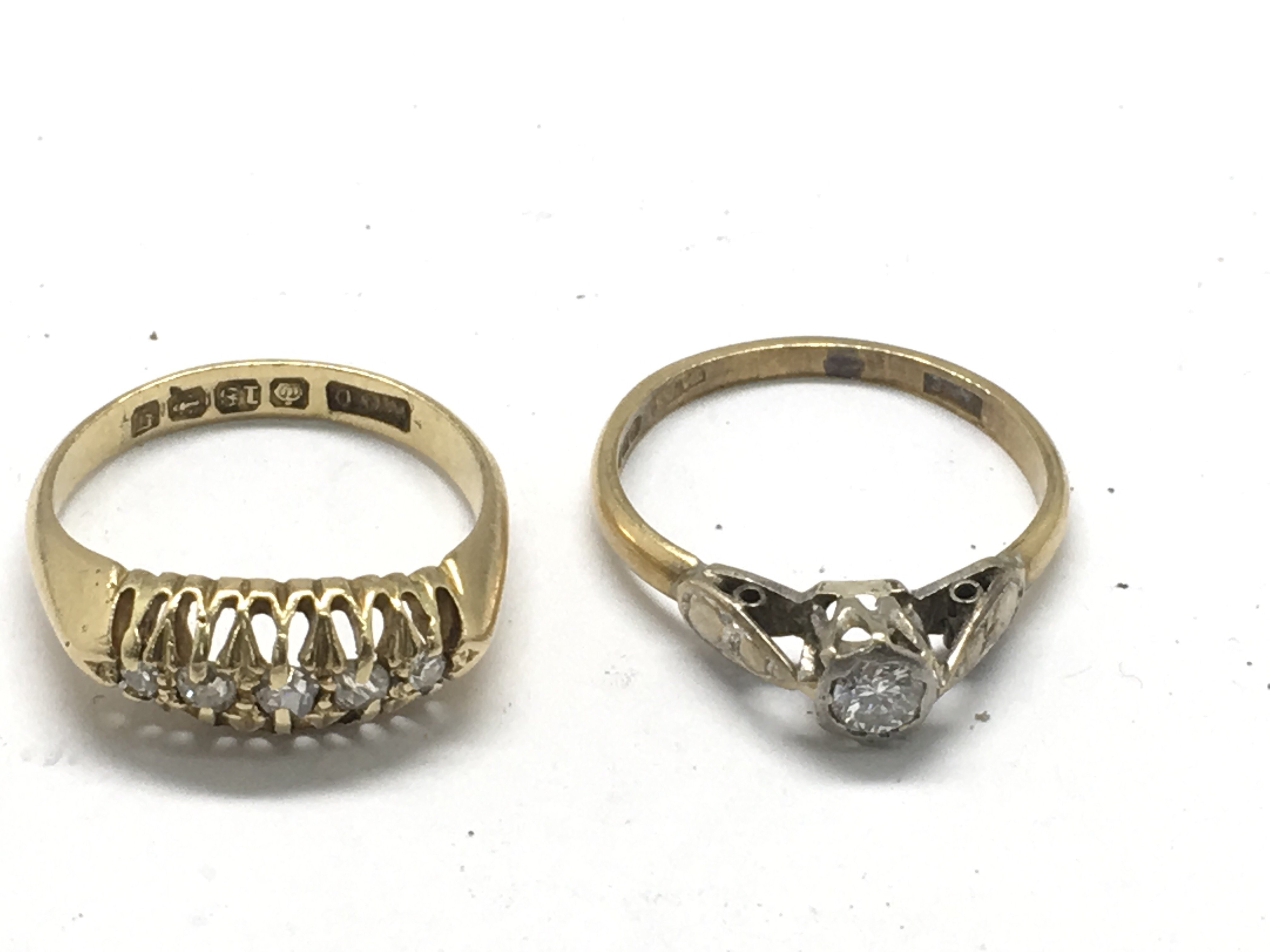 Two 18ct gold rings set with diamonds.Approx size