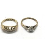 Two 18ct gold rings set with diamonds.Approx size