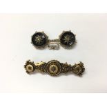 Two gold brooches; one 15ct.