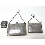 Two silver purses and a Vesta case. Weight approx