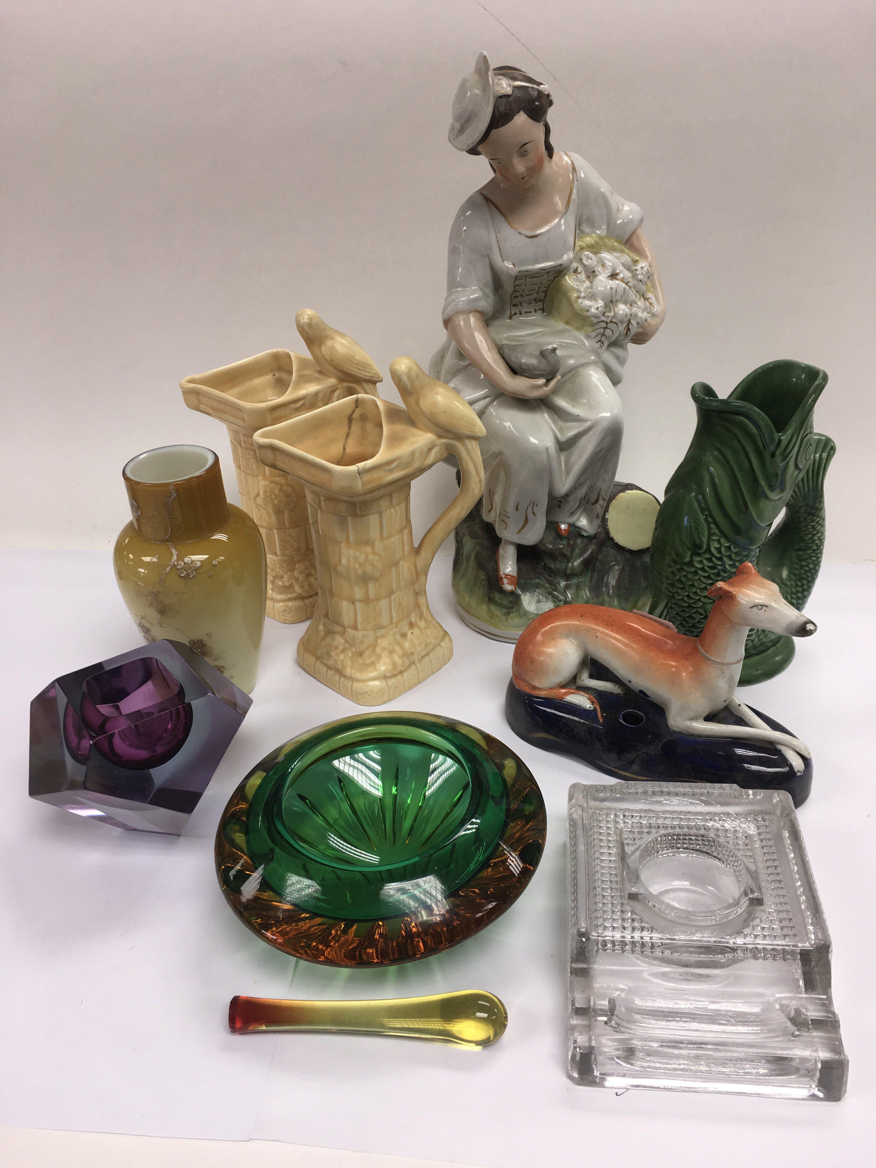 A collection of ceramics and glass including a Staffordshire pen stand, Murano style ashtray, Wade