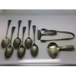 A silver baby spoon and a pusher, silver tea spoon