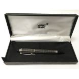 A cased Mont Blanc pen.