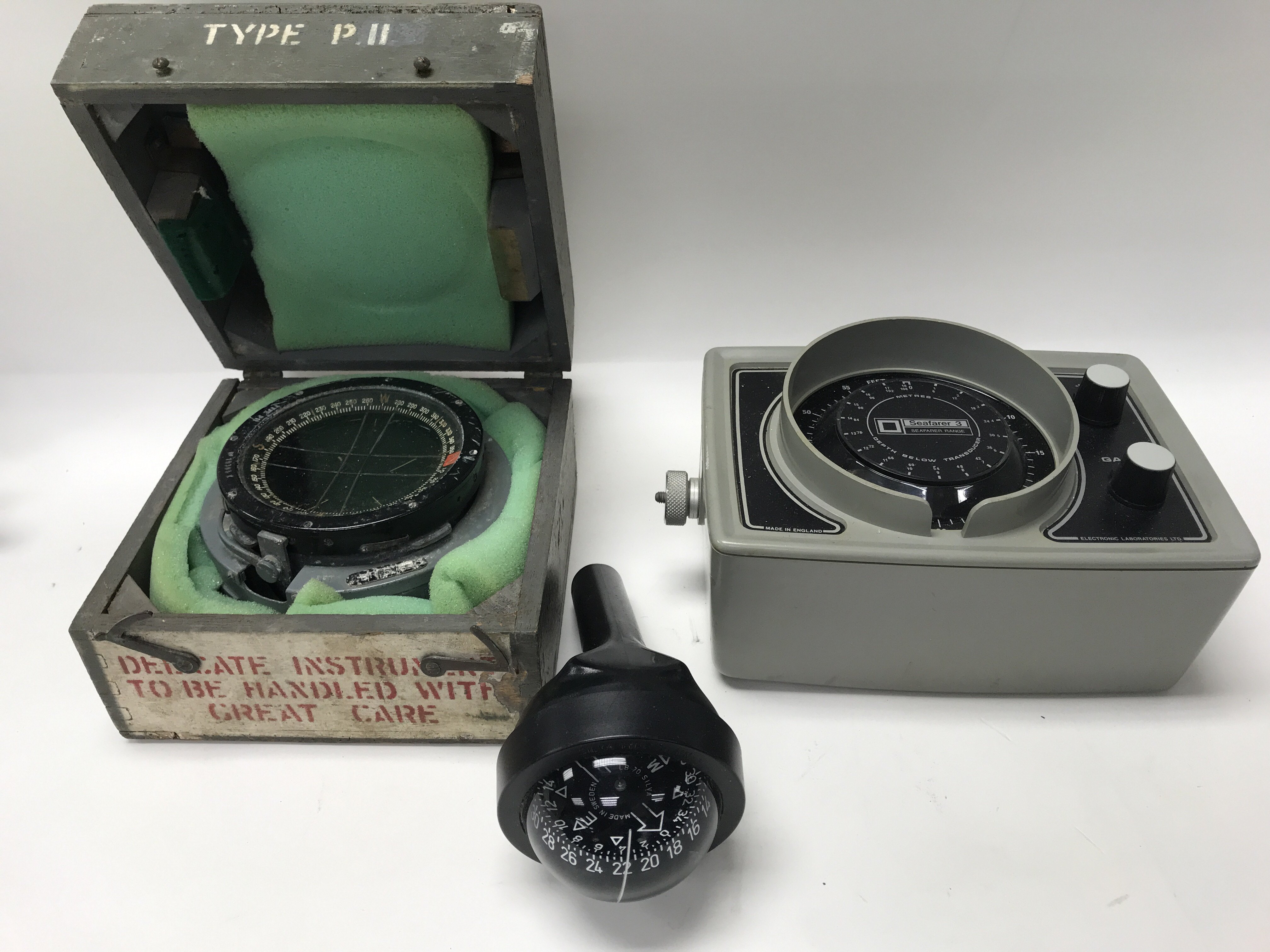A collection of 6 compasses, a brass barometer, a boxed bracket mounted flasher echo sounder and a - Image 2 of 3