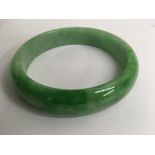 A spinach green jade bangle