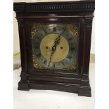 A Quality Edwardian Mahogany double Fusse clock the case with dentil moulding above a brass dial