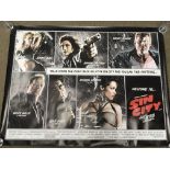 A collection of 12 film posters including Sin City, X Men The Last Stand, Men In Black 2 and