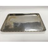 A rectangular silver tray, approx 28.5cm x 20cm an