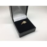 An 18ct rose gold diamond ring set with a .90ct st