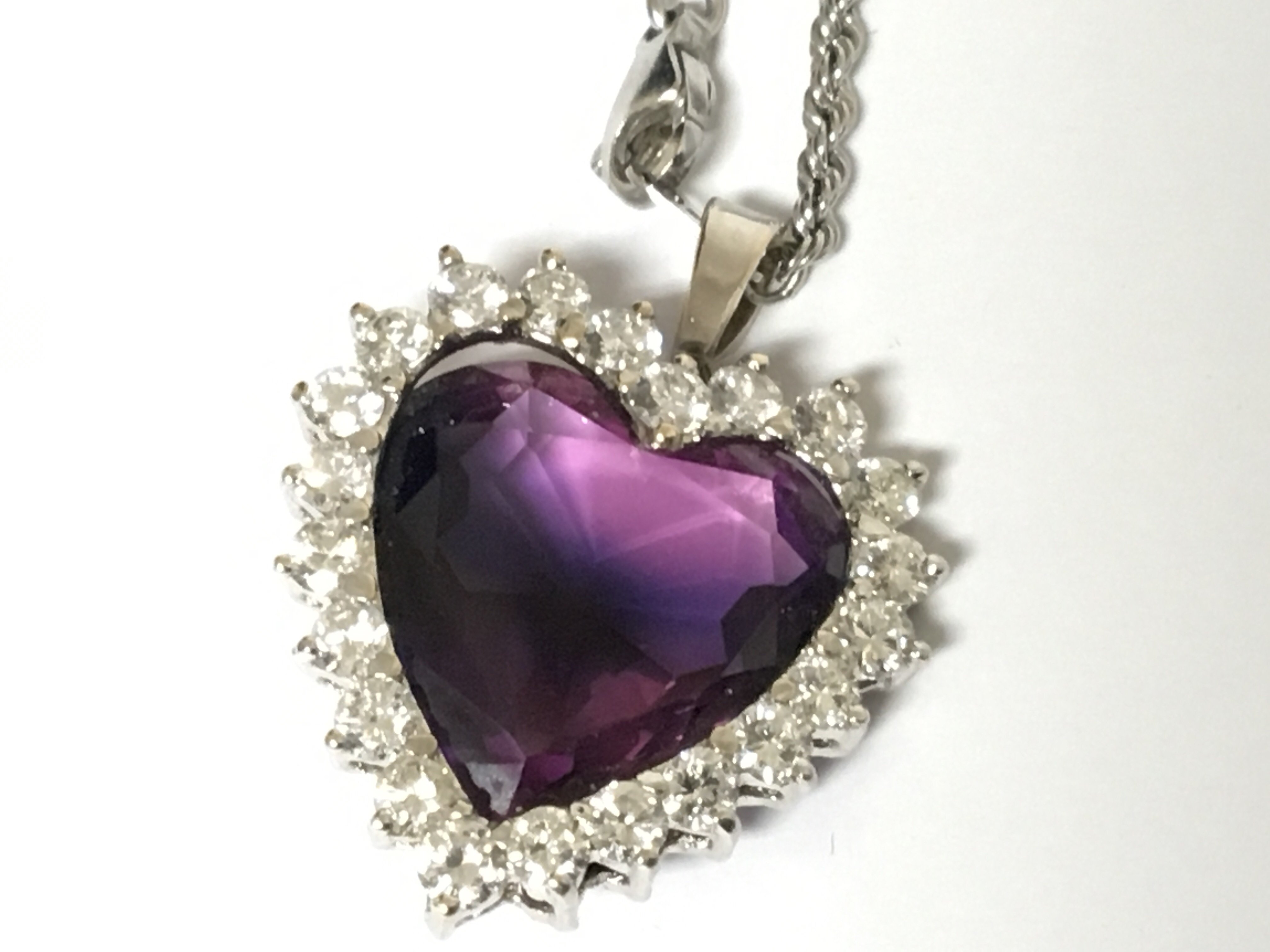 A Quality diamond set heart shaped pendent with an